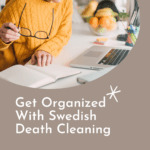 Mature woman sitting at her laptop, holding her glasses in hand and looking over her notes on paper. Caption reads Get Organized With Swedish Death Cleaning, Review & How-To's at tidymalism.com. Post is about estate management and decluttering the home to prepare household for the later stage of life. tidymalism.com