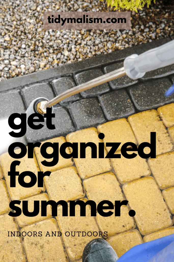 Power washing your patio, deck, or terrace before the hot weather starts is just one thing you should have on your to-do checklist to get organized for summer. Image shows a pressure washer nozzle cleaning outdoor patio pavers. The image is for a blog post about getting everything at home organized for the summer so that you can enjoy the warmer weather without worrying about chores, housekeeping, or home repairs and maintenance. For more tips on summer home organization visit tidymalism.com.