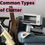 A heap of clutter in a room: old fans, ventilators, a mini oven, old vaccum cleaner, wooden stools, all piled up on a broken old blue sofa. Caption reads: The 4 most common types of clutter.