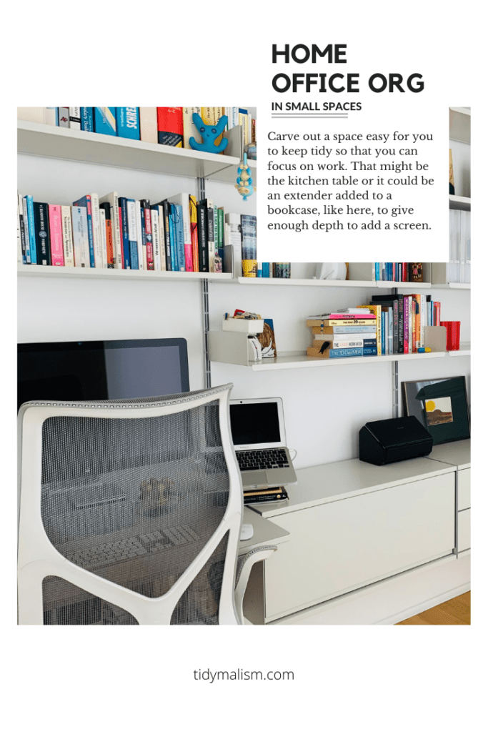 Picture of a white Vitsoe 606 bookshelf designed by Dieter Rams, in a small home office space. The walls are white and in front of the shelving unit is a Cosm chair from Herman Miller. There is an extender shelf on the lower half of the unit, the depth of which has room for a computer screen and a laptop stand. The room is very bright and tidy, welcoming one to settle in to home office work.
