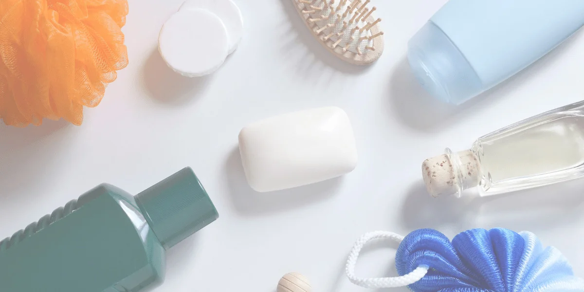 Assortment of bath products like shower gel and soap.