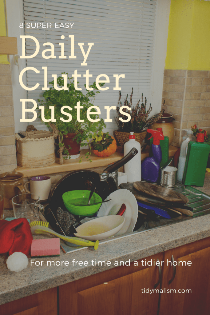 Photo of a messy kitchen. The sink is full of dirty dishes piling over onto the countertop. There are spray bottles, sponges, and rags and scrubbers to the left of the sink, along with more dirty coffee mugs. Caption reads 8 Super Easy Clutter Busters for More Free Time and a Tidier Home and illustrates an article about daily decluttering bursts.