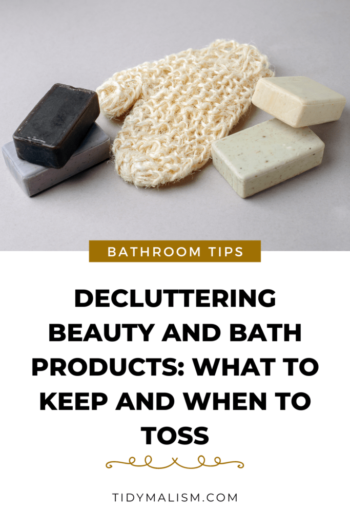 Photo of a natural loofah sponge and some handmade soap bars in different colours like black, grey, beige and light green. When you declutter beauty products you should also have a look through the rest of your bathroom stash to see what needs to be replaced.
