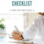 Cropped image of a woman in a white blouse holding a fountain pen in her right hand. She's working through a decluttering checklist to get her household in order and embrace more minimalism at home.
