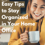 Photo of a thirty-something woman in a yellow jumper sitting at her open laptop on her desk. She's holding a white cup of coffee in her right hand and smiling into the camera. Caption reads: 10 easy tips to stay organized in your home office.