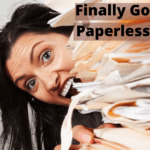 Woman's face poking around from behind a huge stack of paper clutter. Her mouth is wide open as if she's saying "argh!". Caption reads: what you need to finally go paperless.