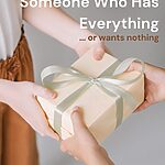Cropped image of a white woman accepting a small gift wrapped in eco-friendly wrapping paper, with a pale green bow.