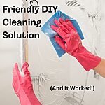 Two pink rubber-gloved hands wiping down a glass shower door. Caption reads: I tried this cheap eco-friendly cleaning solution and it worked.