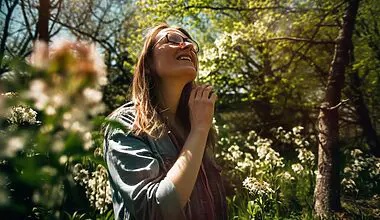 The tranquil and serene atmosphere of a woman outdoors in beautiful springtime weather, who is feeling sleepy and exhausted from springtime fatigue.