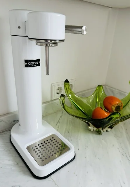 an aarke carbonator iii in white on the kitchen counter, one my best bits of shopping as a minimalist this year